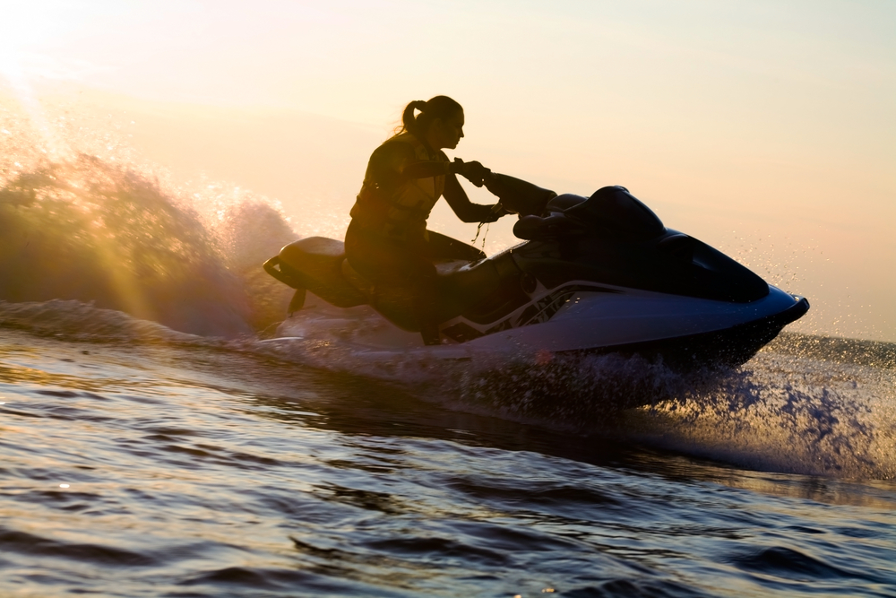A person rides a jet ski A person rides a jet ski
